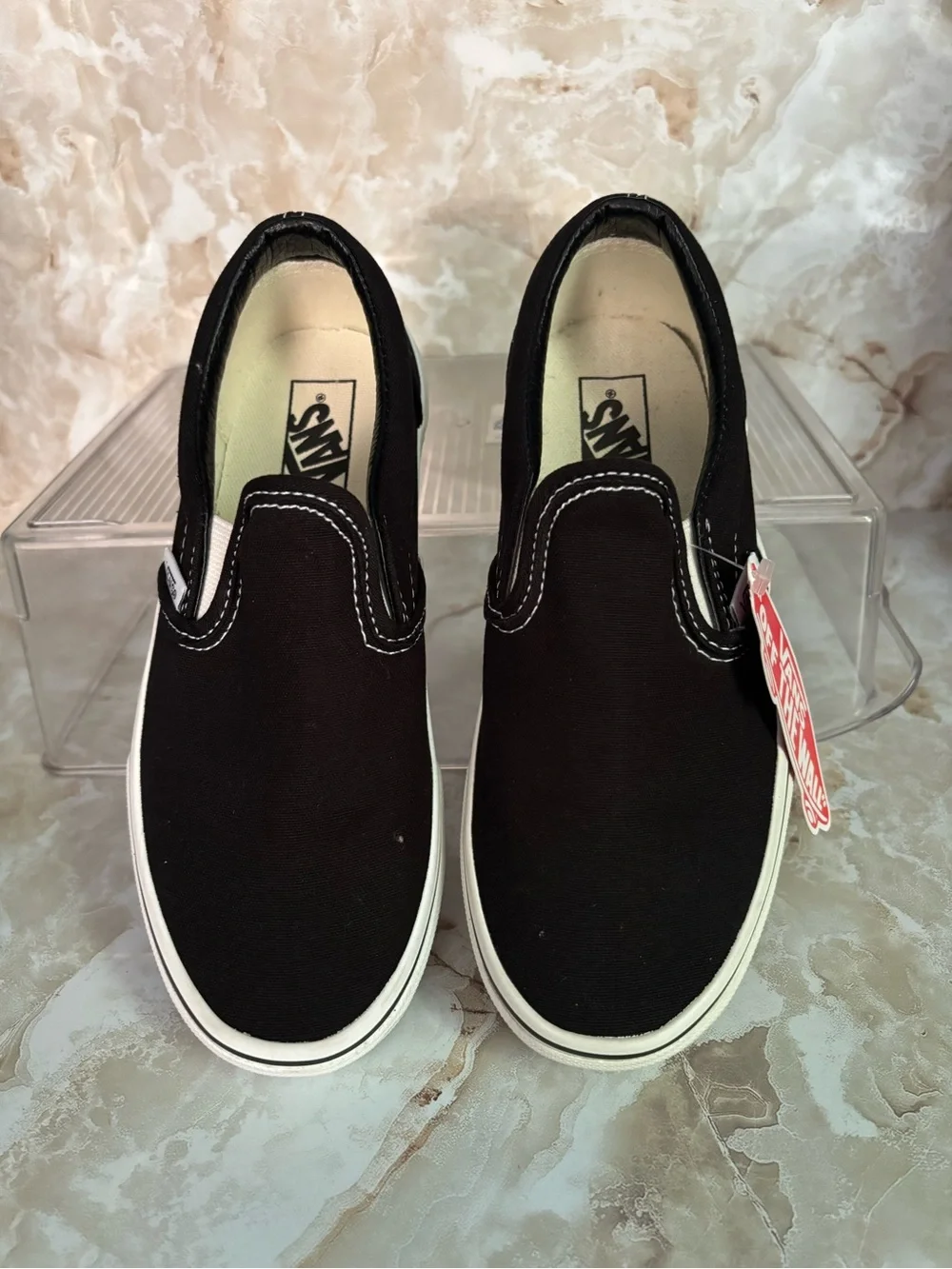 Vans Black and White Slip-On Canvas Sneakers